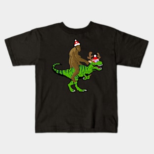 Bigfoot Riding a T Rex Going for Christmas Party Kids T-Shirt